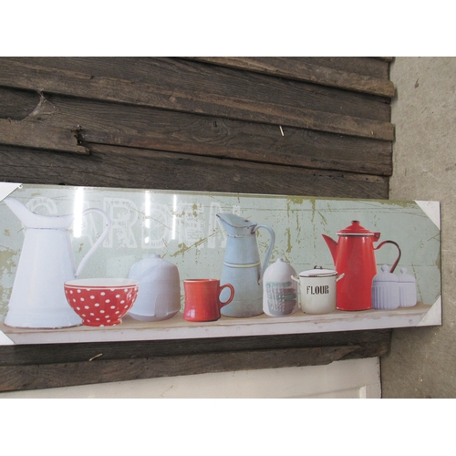 2497 - A canvas wall hanging of enamelware