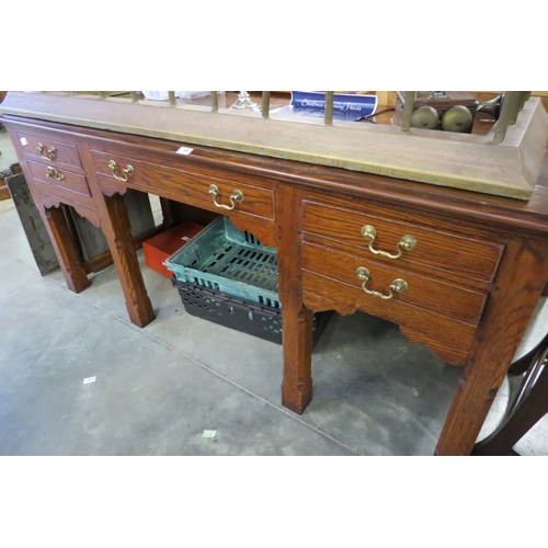 2002 - A reproduction Georgian oak side table, five frieze drawers, on chamfered square legs, brass swan ne... 