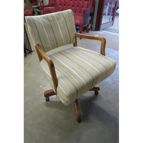 2003 - A 1930's oak office chair with modern upholstery   (R) £40