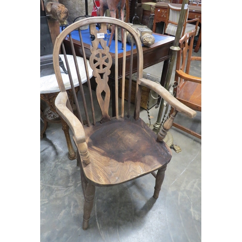 2025 - A Victorian elm seated carver chair