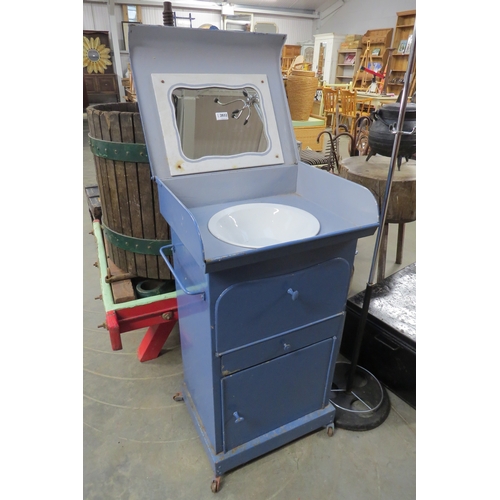 2032 - A blue painted metal officers washstand with mirror to interior