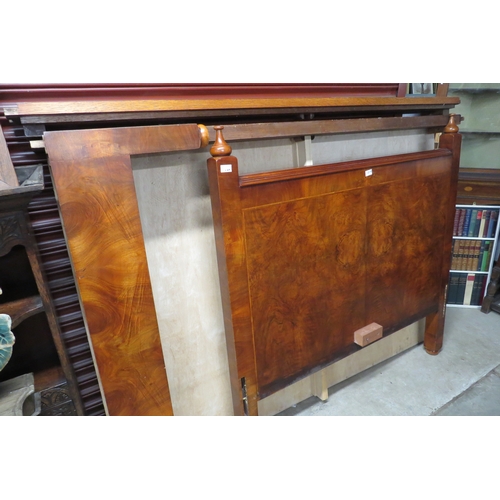 2119 - A figured walnut bed frame with base 136cm wide    (E) £30-40