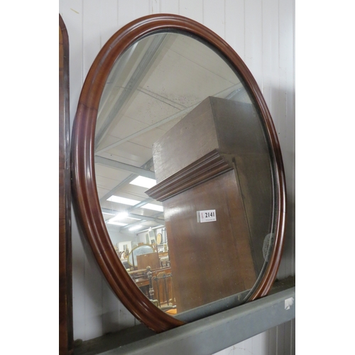 2141 - A Victorian mahogany oval wall mirror with speckled mercury glass mirror plate 66 x 50cm