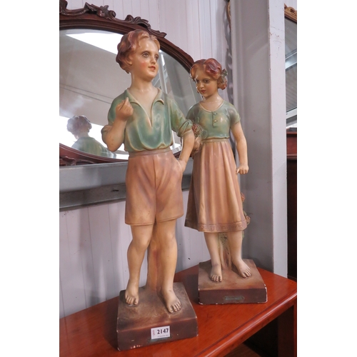 2147 - A pair of 1930/40's plaster figures of Chums