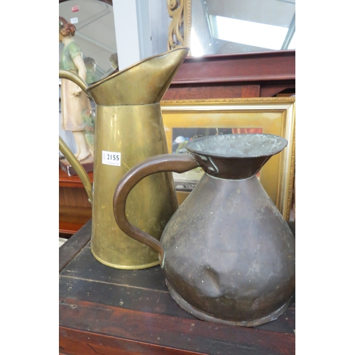 2155 - A Victorian copper jug and brass jug