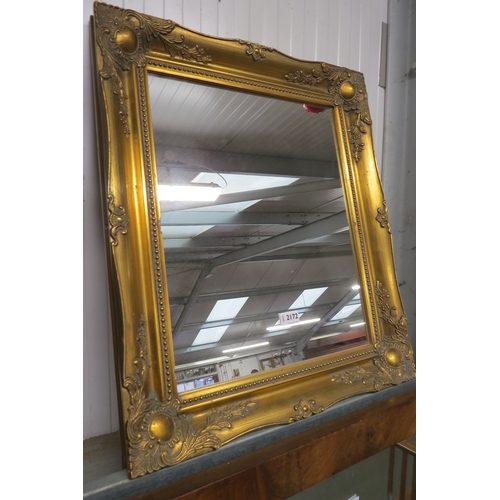 2172 - An ornate gilt framed mirror