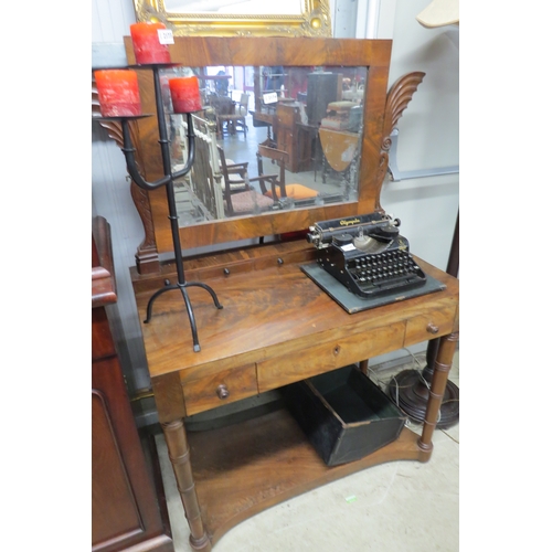 2174 - An early 19th Century mahogany dressing table with carved supports with worn Mercury mirror plate   ... 