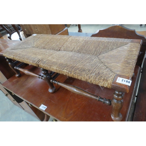 2188 - An low oak rush seated footstool