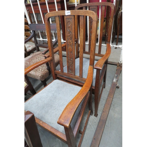 2193 - Two oak carver elbow chairs   (R) £10