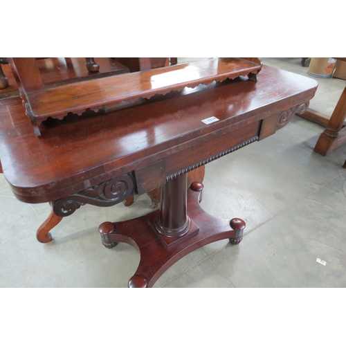 2214 - A William IV mahogany fold-out table