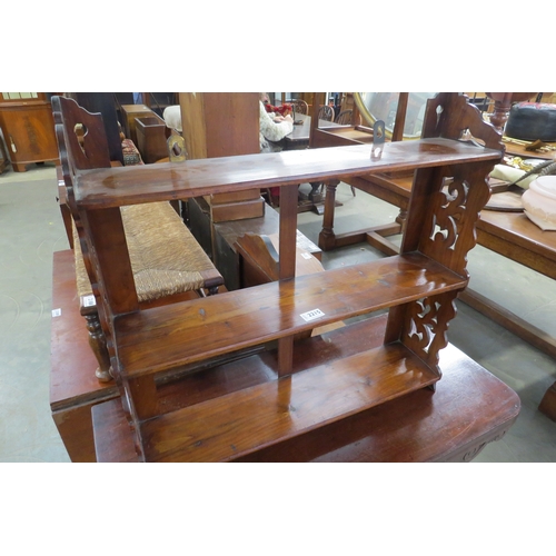 2215 - An Edwardian walnut three tier shelf   (E) £15-25