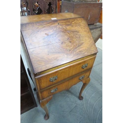 2222 - A 1930's walnut bureau   (R) £30