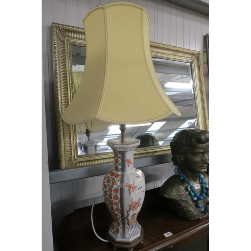 2225 - An oriental table lamp and shade   (R) £30