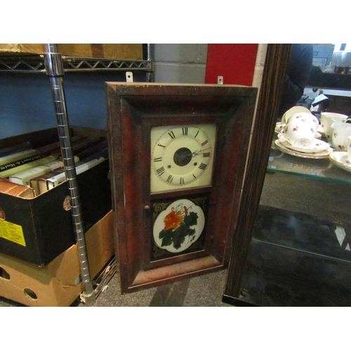 1417 - A mahogany wall clock Roman numerated chapter ring, single glazed door, lower section painted with f... 