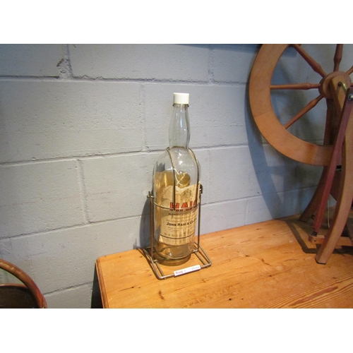 1435 - A large Haig Whisky advertising empty bottle and stand, 52cm tall     (R) £20