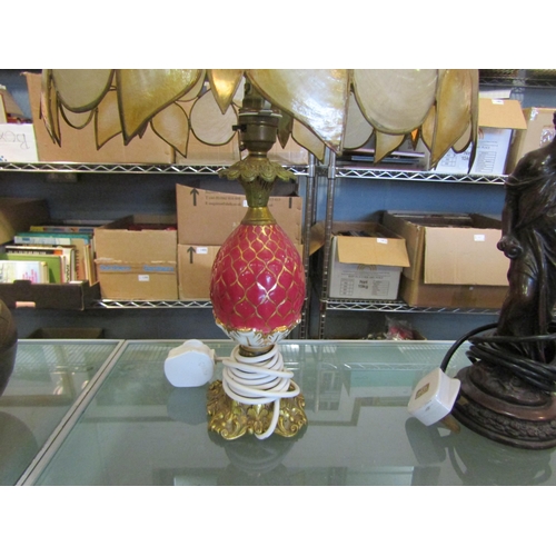 1440 - A metal figural lamp base female under opaque lamp shade and a table lamp with shell effect sectiona... 