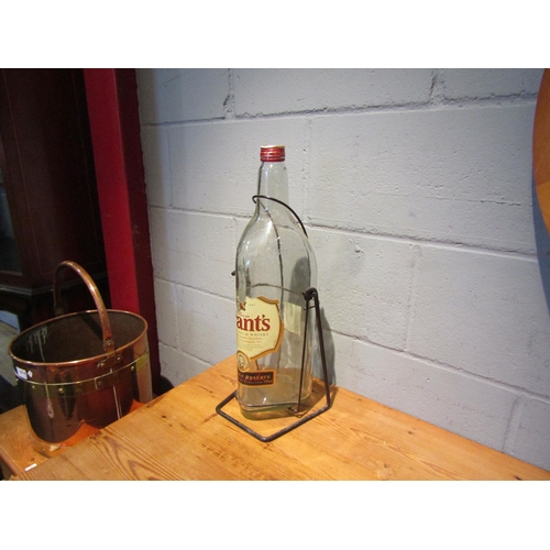 1442 - A large Grant's Whisky advertising empty bottle and stand, 50cm high     (R) £15