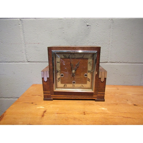 1455 - A 1940's oak mantel clock, 8-day Westminster chime, Roman numerated chapter ring, key and pendulum