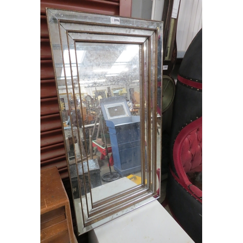 2096 - A deco style mirror with stepped frame worn plate