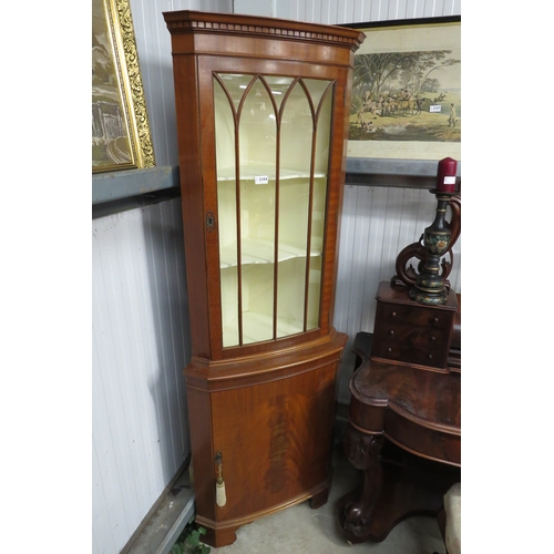 2164 - A reproduction mahogany corner cabinet