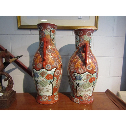 1003 - A near pair of Chinese famille rose twin handled vases of large proportions, a/f, both with damage/r... 