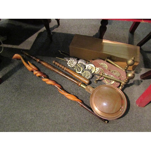 1129 - A collection of items; truncheon, brass fireside set, bed warming pan, etc