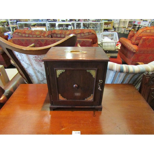 1146 - An Edwardian stationery box, single door, brass brackets, single shelf and writing box to interior, ... 