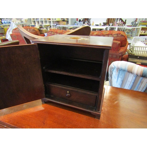 1146 - An Edwardian stationery box, single door, brass brackets, single shelf and writing box to interior, ... 