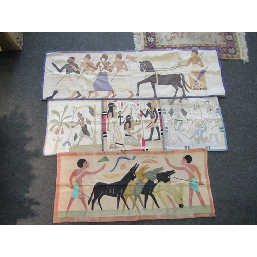 1402 - A box of 1920's/30's hand appliqued Egyptian influenced textiles, two panels and two cushion covers