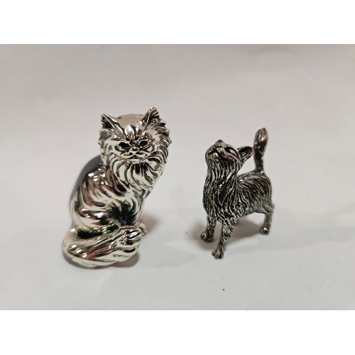 1313 - Two silver cast figures of cats