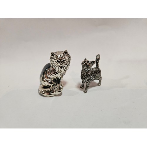 1313 - Two silver cast figures of cats