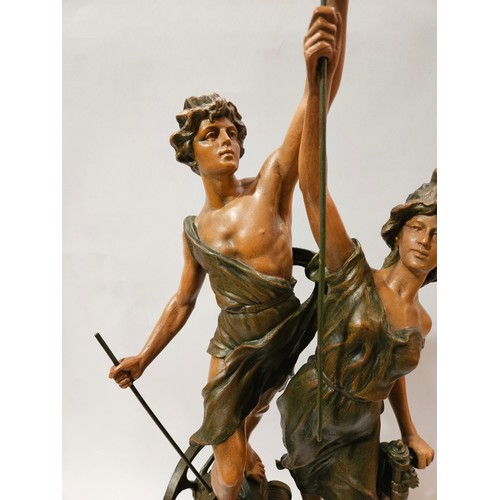 4039 - An Art Nouveau style sculpture of a couple in classical pose, 72cm tall