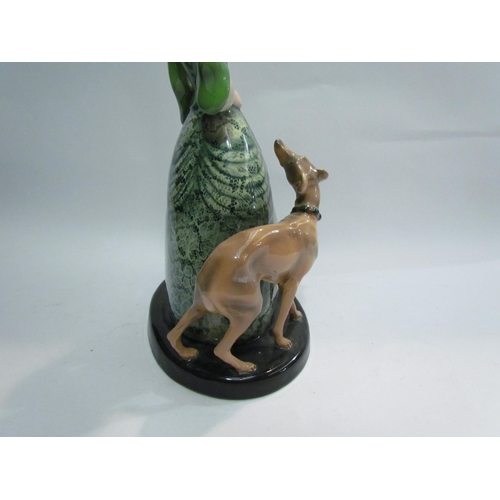 4045 - A Goldscheider figure of maiden in a green dress with hound, 35cm tall, marks to base, made in Germa... 