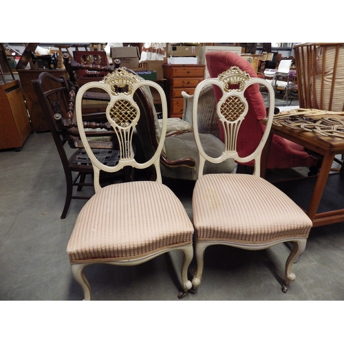 2269 - A pair of cream and gold painted French bedroom chairs