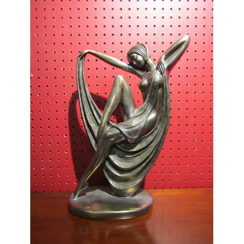 4029 - An Art Deco style metallic resin figurine of a semi-clad female, 33cm tall, together with a Tiffany ... 