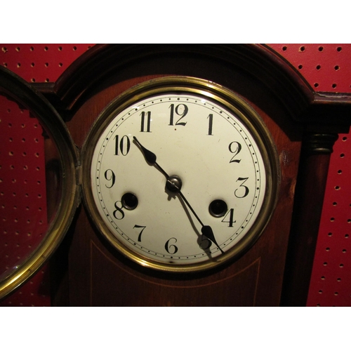 4030 - An Edwardian mantel clock with key and pendulum