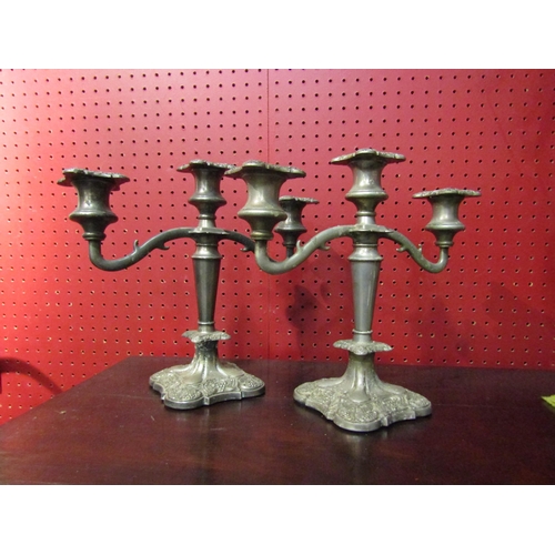 4038 - A pair of plated three sconce candelabra, 25cm tall      (E) £10-20