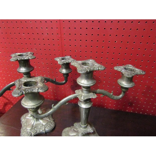 4038 - A pair of plated three sconce candelabra, 25cm tall      (E) £10-20