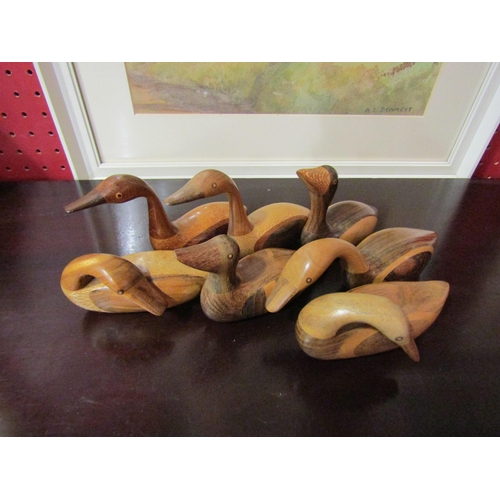 4046 - A collection of seven wooden ducks