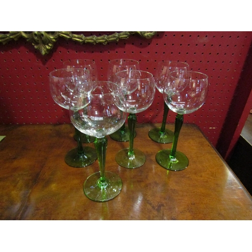 4082 - A collection of seven green stem hock glasses