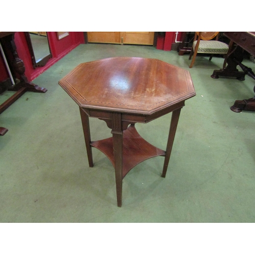 4090 - An Edwardian mahogany occasional table, octagonal top, with strung inlay and under-tier, 72cm tall  ... 