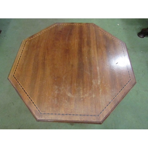 4090 - An Edwardian mahogany occasional table, octagonal top, with strung inlay and under-tier, 72cm tall  ... 