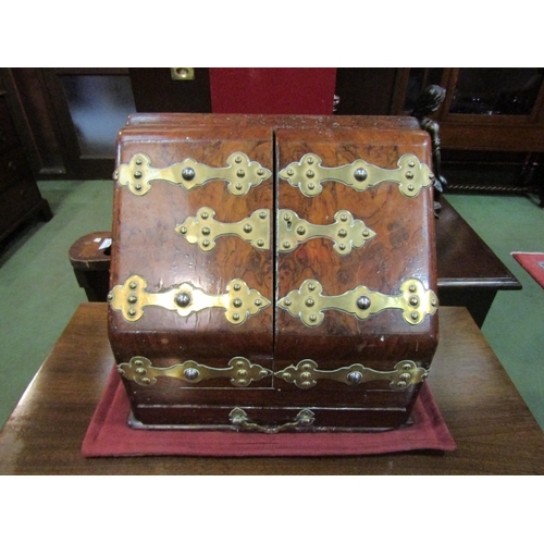 4116 - A burr walnut stationery box, hinged front opening bearing brass Gothic influence mounts, single dra... 