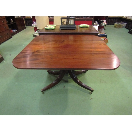 4122 - A Circa 1840 flame mahogany reeded edge cornered tilt-top table on a turned column and carved acanth... 