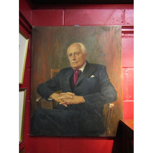 4142 - N. SLADE: An oil on canvas of a seated gentleman wearing suit, signed bottom left, 76cm x 63.5cm