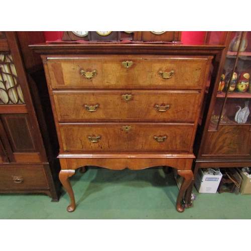 4156 - A George III herringbone crossbanded walnut canted corner chest of three long drawers (base one a se... 