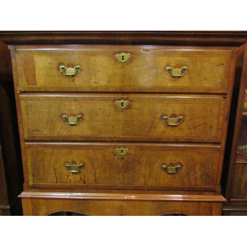 4156 - A George III herringbone crossbanded walnut canted corner chest of three long drawers (base one a se... 