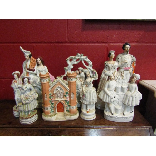 4166 - A quantity of Staffordshire figures including 