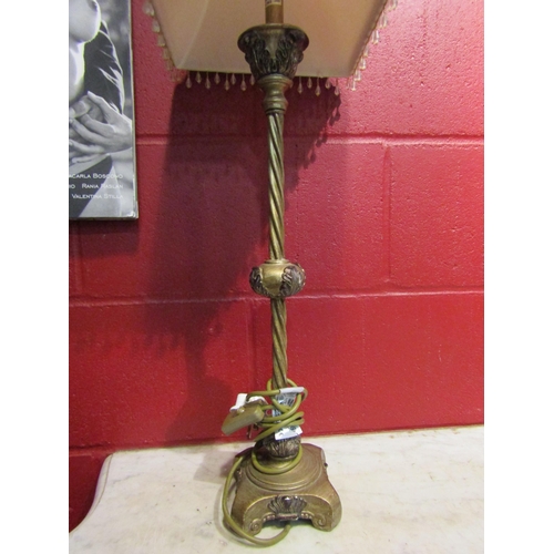 4169 - A brass effect spiral column table lamp