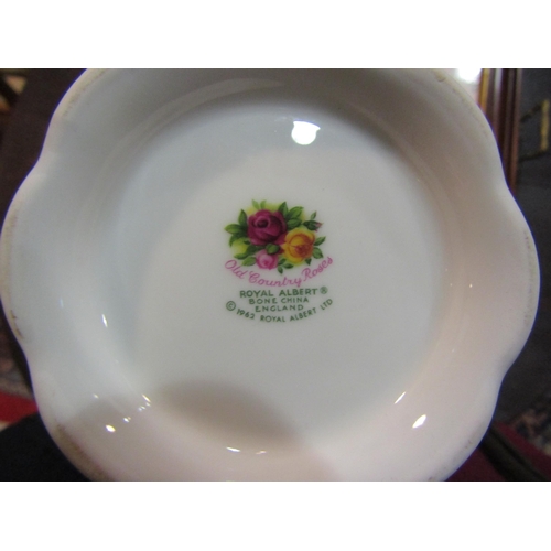 4192 - A collection of 'Old Country Roses' ceramics to include posy, bread and butter plate, baluster form ... 